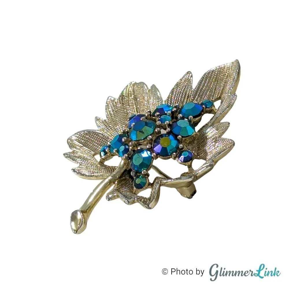 Vintage Blue Aurora Borealis Rhinestone Leaf Gold Tone Textured Brooch